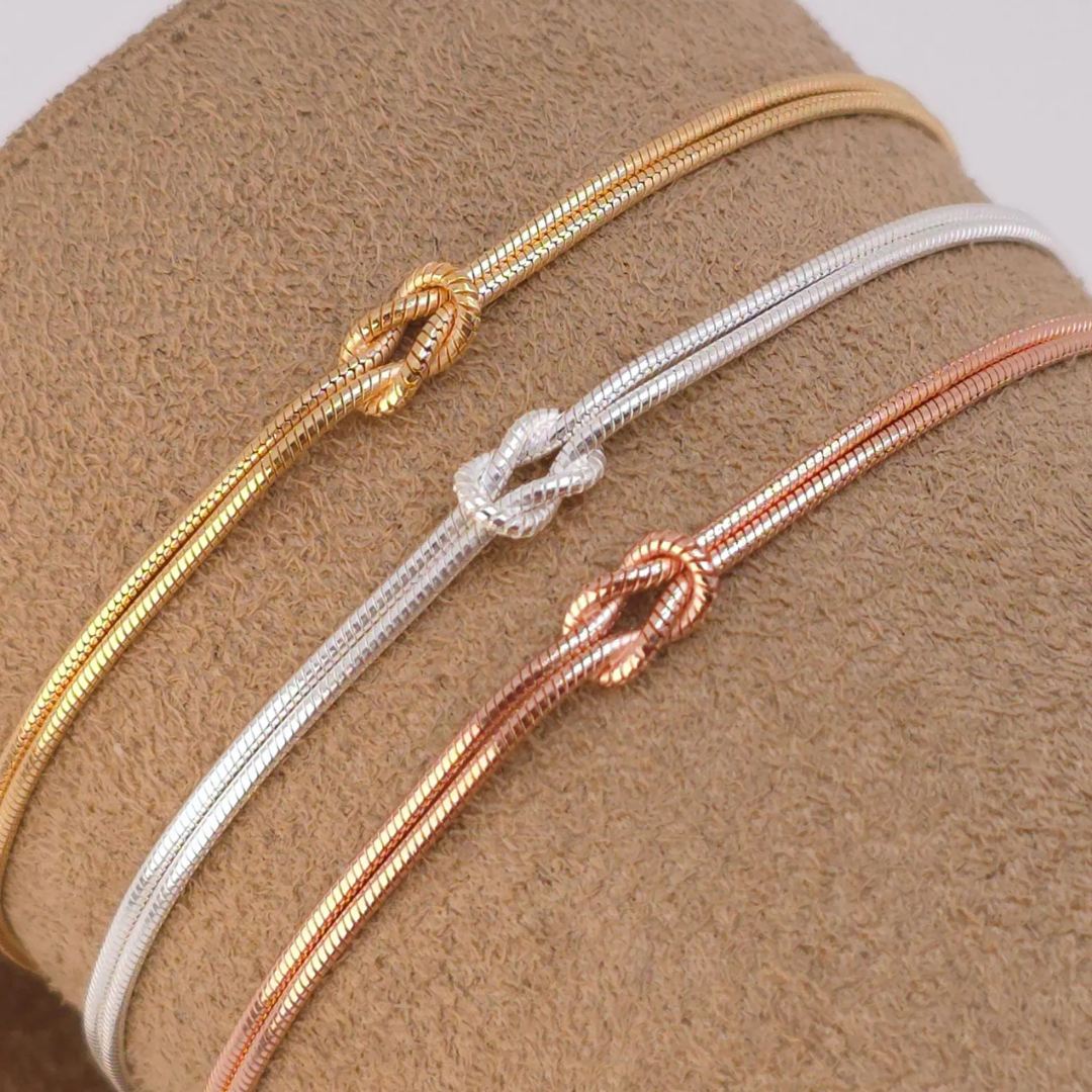 Eternal Knot Armband | Unterstütze Brustkrebs (1+1 GRATIS)