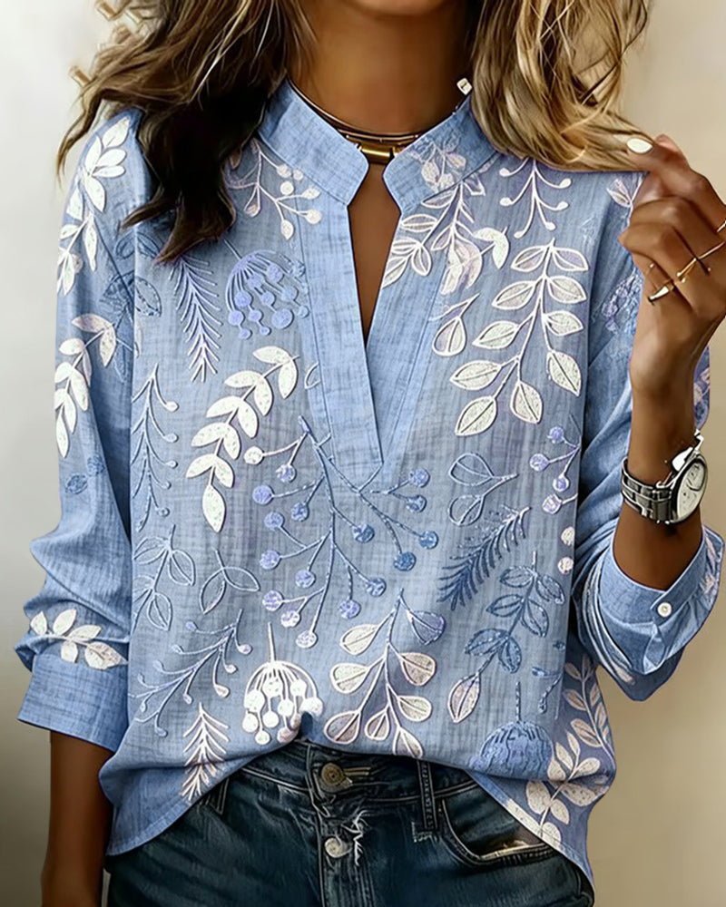 Bluse mit Blumendruck und hohem Kragen