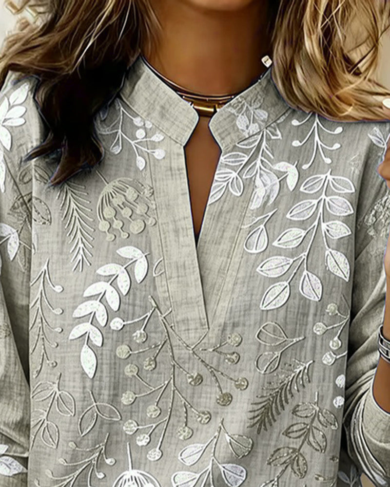 Bluse mit Blumendruck und hohem Kragen