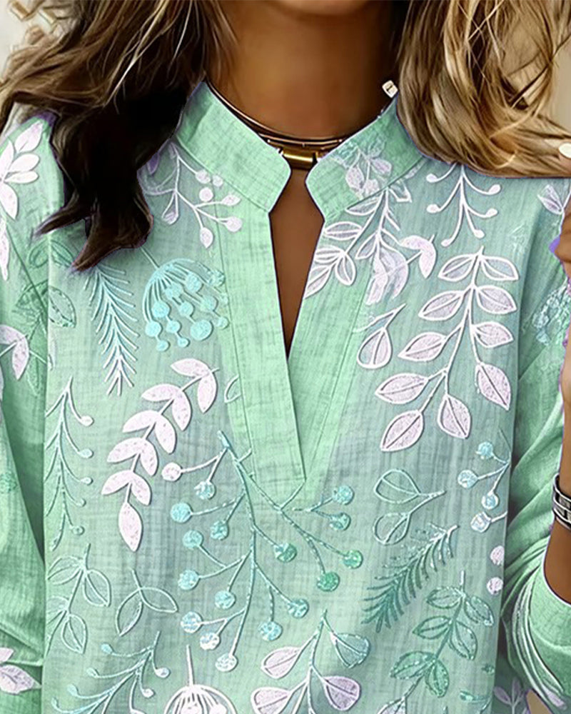 Bluse mit Blumendruck und hohem Kragen