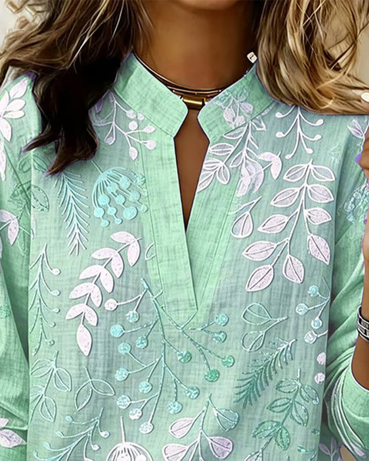 Bluse mit Blumendruck und hohem Kragen