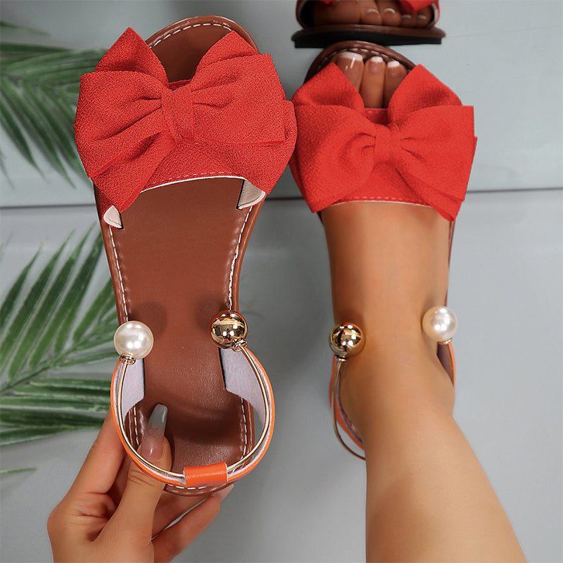 Alvilde – Sandalen mit Schleife und Perlen