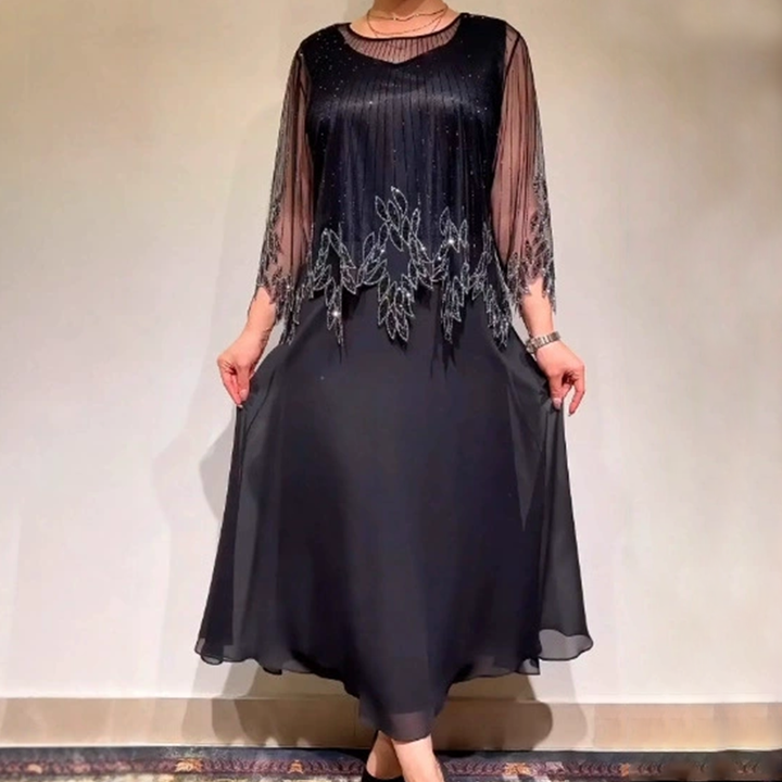 Eliza – Elegantes Kleid mit schimmernder Overlay-Schicht