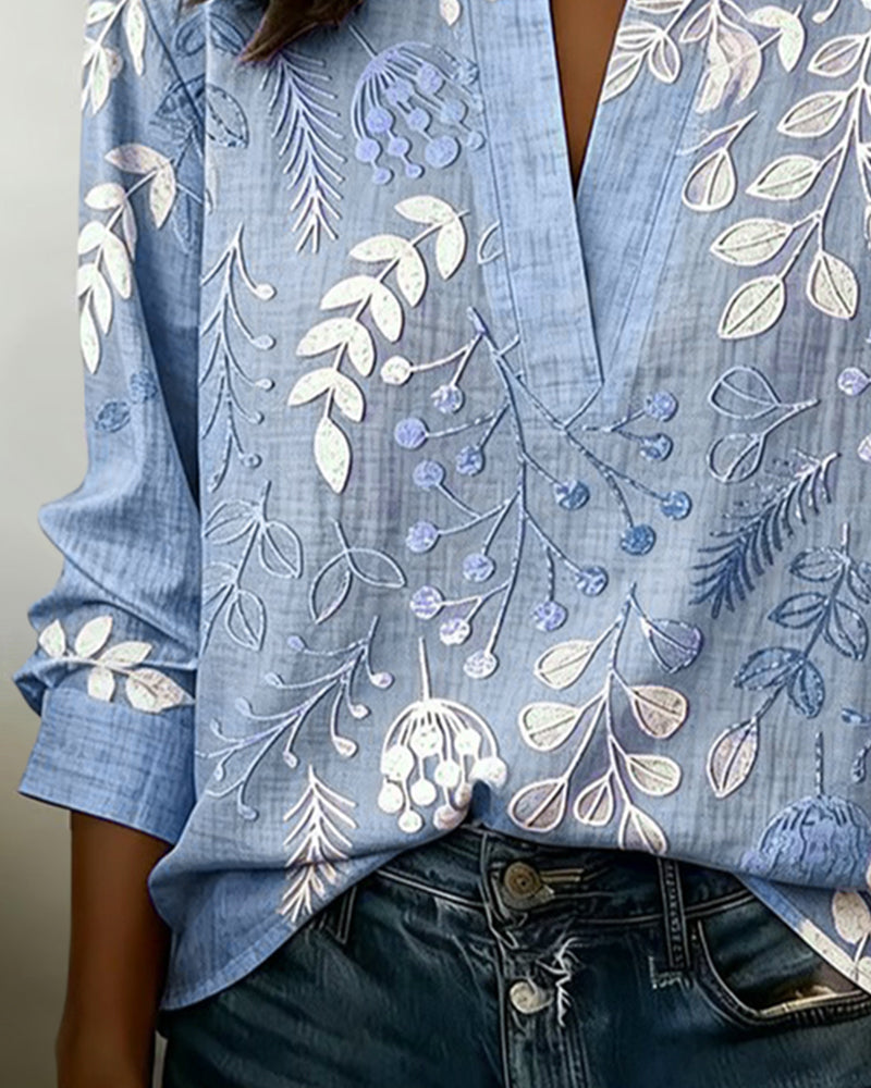 Bluse mit Blumendruck und hohem Kragen