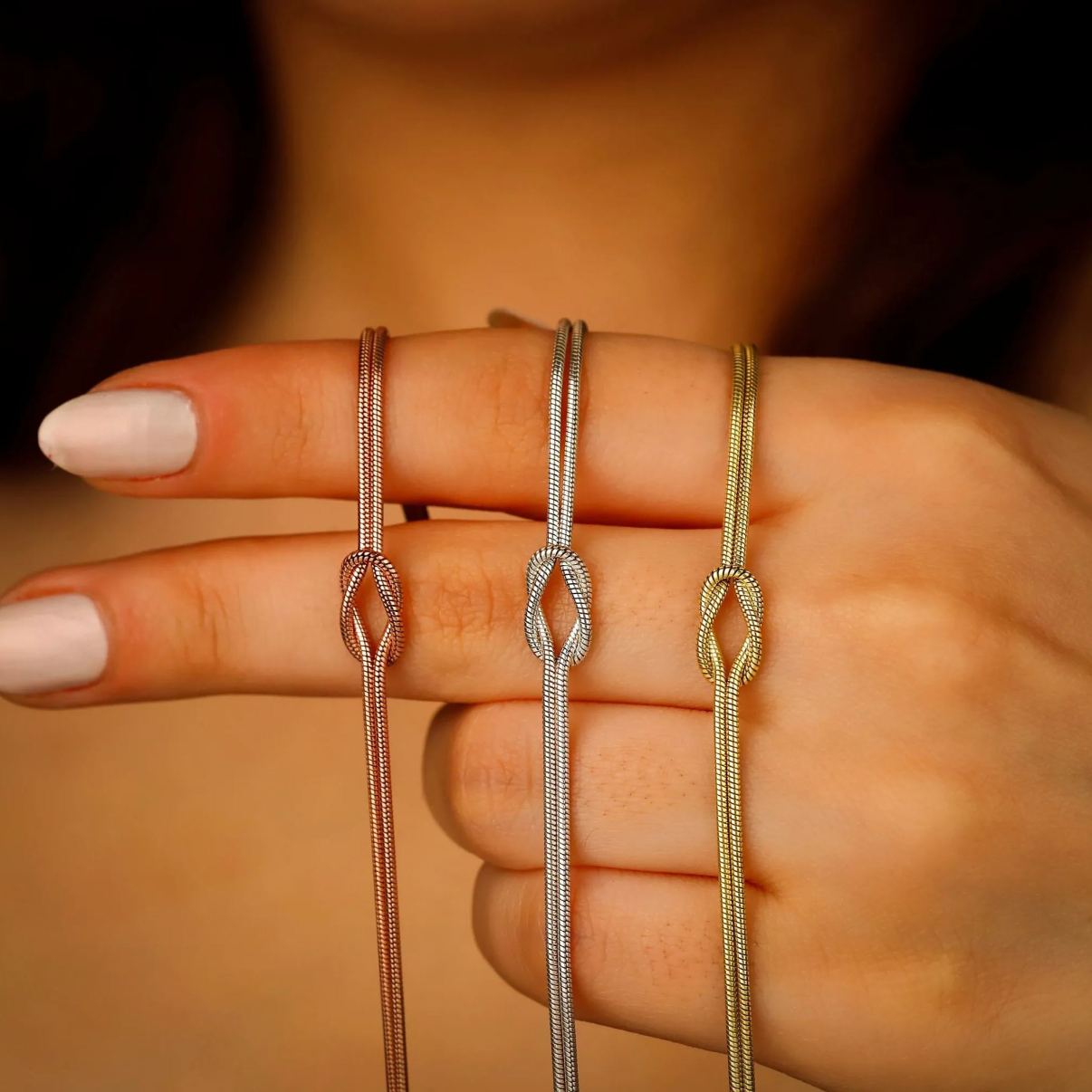 Eternal Knot Armband | Unterstütze Brustkrebs (1+1 GRATIS)