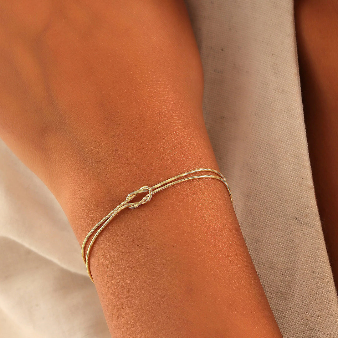 Eternal Knot Armband | Unterstütze Brustkrebs (1+1 GRATIS)