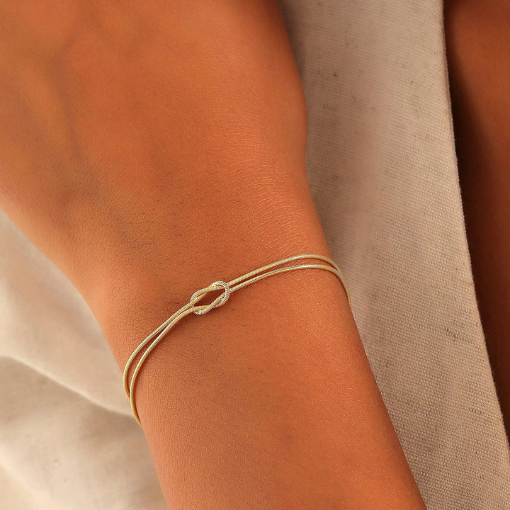 Eternal Knot Armband | Unterstütze Brustkrebs (1+1 GRATIS)