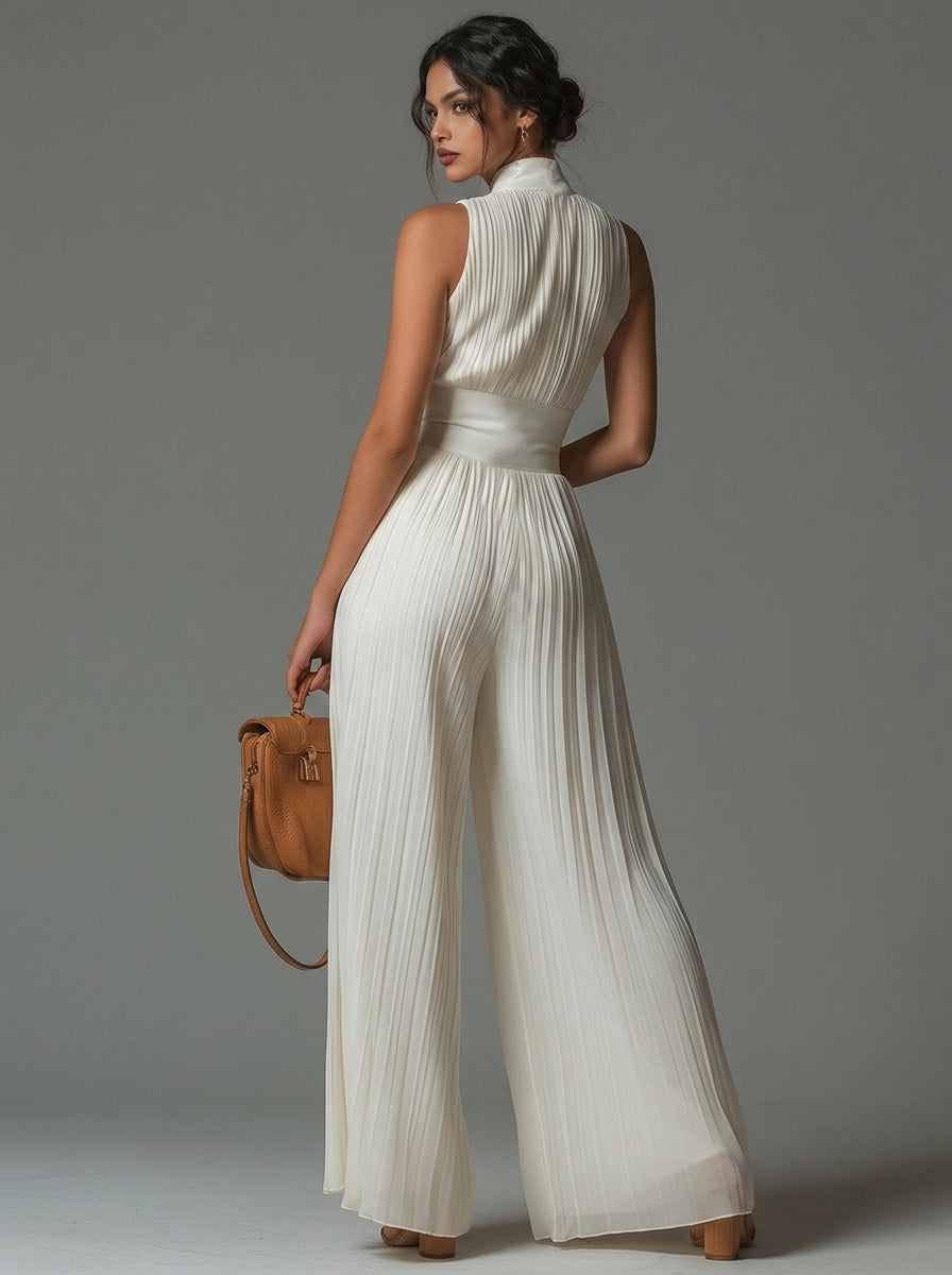 ÉLAN – Skulpturaler Plissee-Jumpsuit