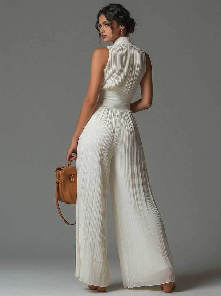 ÉLAN – Skulpturaler Plissee-Jumpsuit
