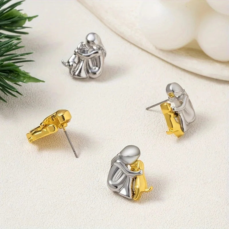 Zweifarbige Ohrstecker aus Silber und Gold