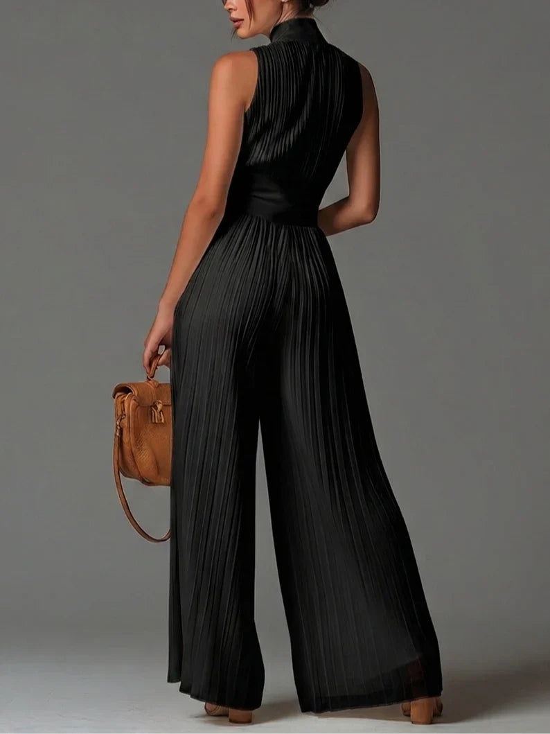 ÉLAN – Skulpturaler Plissee-Jumpsuit