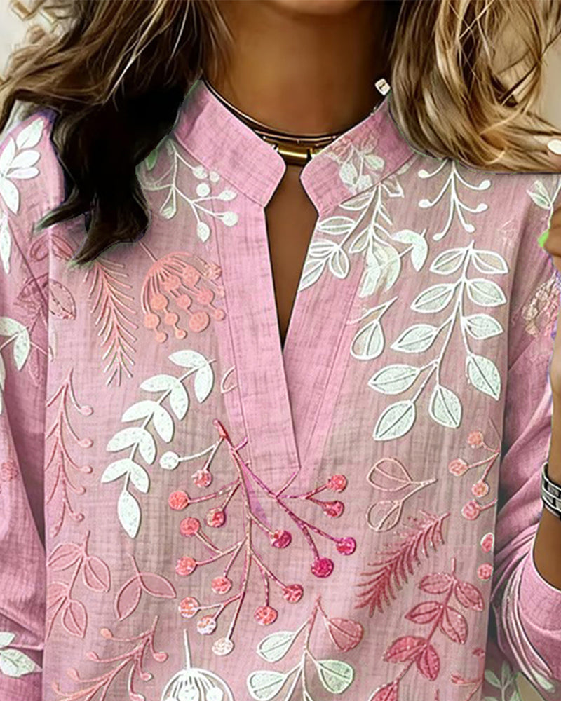 Bluse mit Blumendruck und hohem Kragen