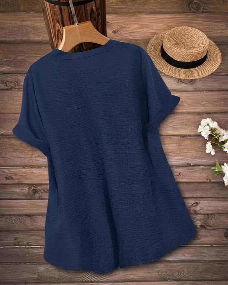 Unifarbene Bluse mit Seitenschlitz und kurzen Ärmeln