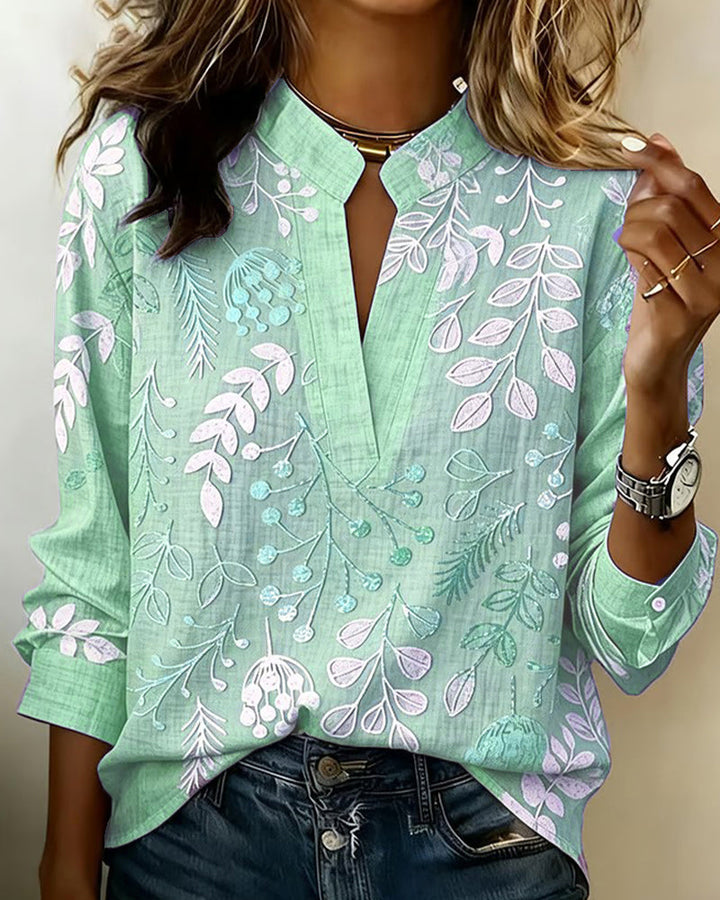 Bluse mit Blumendruck und hohem Kragen