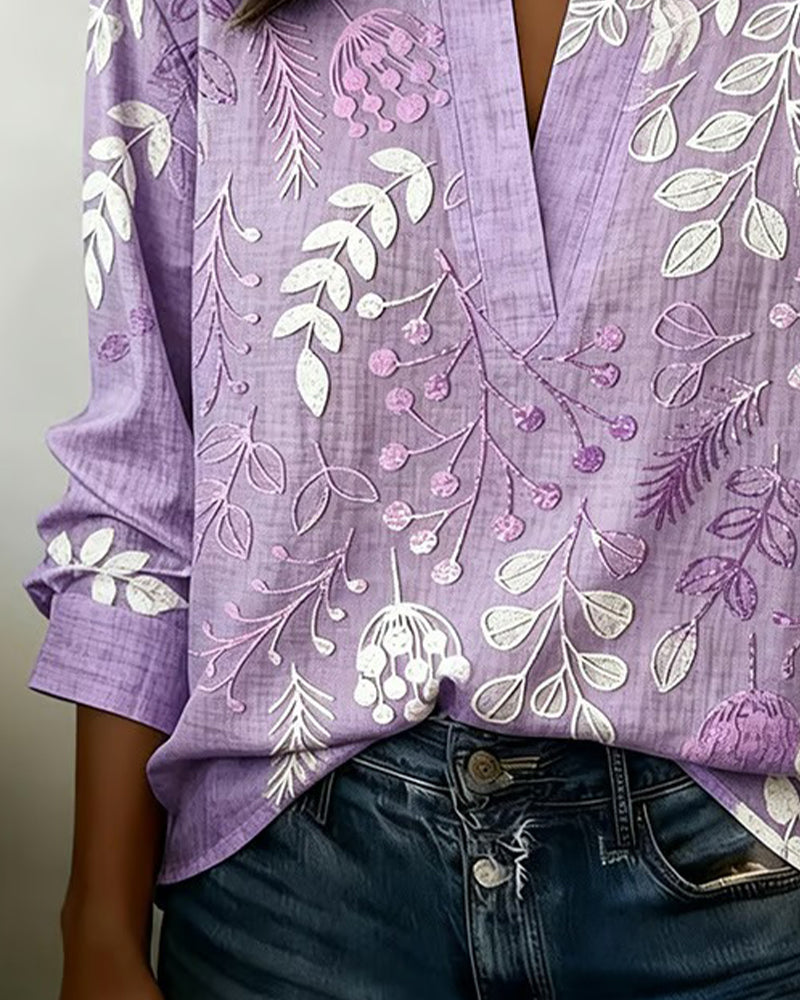 Bluse mit Blumendruck und hohem Kragen