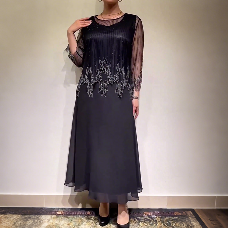Eliza – Elegantes Kleid mit schimmernder Overlay-Schicht
