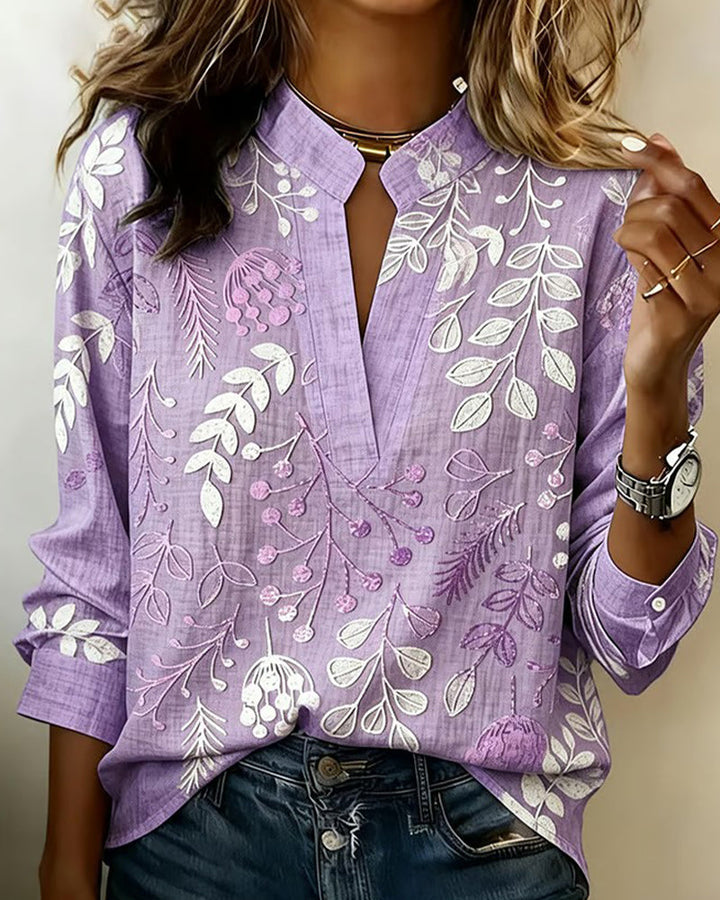 Bluse mit Blumendruck und hohem Kragen