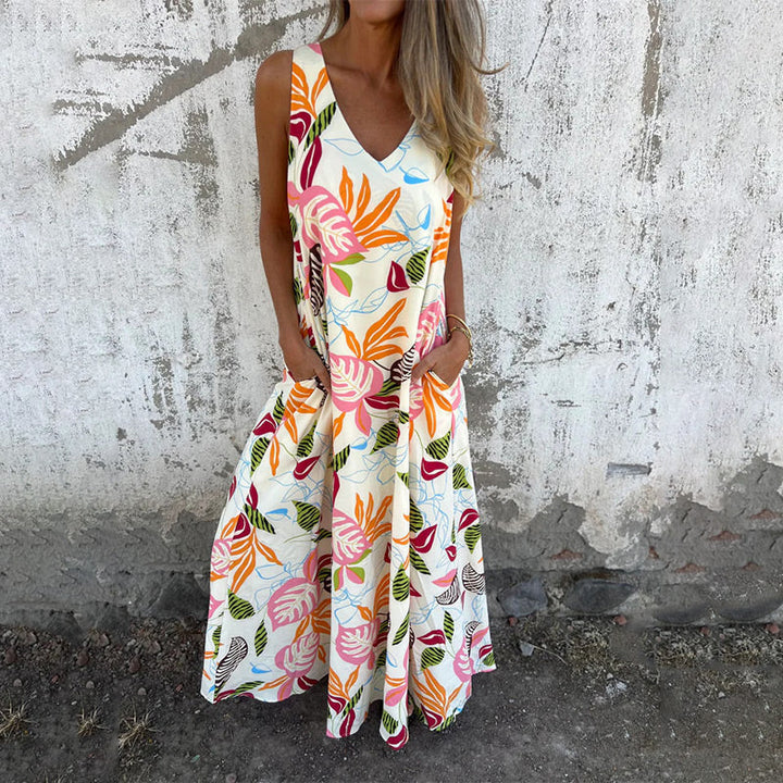 YLVA I MAXIKLEID MIT V-AUSSCHNITT