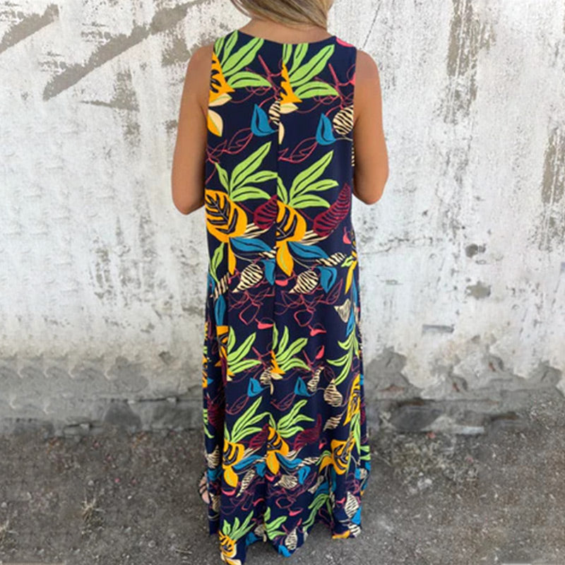 YLVA I MAXIKLEID MIT V-AUSSCHNITT